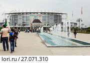 The Akhmat Arena Stadium in Grozny. Chechnya. Стадион «Ахмат-Арена» (Спорткомплекс имени Ахмат-Хаджи Кадырова) в Грозном перед началом футбольного матча (2013 год). Редакционное фото, фотограф Jon Maldini / Фотобанк Лори