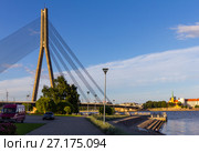 RIGA, LATVIA Vansu Bridge over Daugava River in Riga, Latvia. One of five big bridges in Riga and the only cable-stayed (2017 год). Стоковое фото, фотограф Алексей Ширманов / Фотобанк Лори