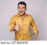 smiling man pointing at you. Стоковое фото, фотограф Александр Лычагин / Фотобанк Лори