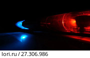 Police blue and red lamp flashing spinning in the dark. Стоковое видео, видеограф Курганов Александр / Фотобанк Лори