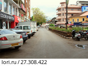 Goa, India - March 01, 2015: Mahatma Gandi Road in Panjim city. Редакционное фото, фотограф Курганов Александр / Фотобанк Лори
