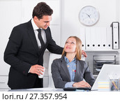 Sexual harassment between colleagues. Стоковое фото, фотограф Яков Филимонов / Фотобанк Лори
