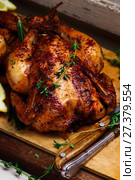SUMAC ROAST CHICKEN WITH LEMON AND GARLIC. Стоковое фото, фотограф Зоряна Ивченко / Фотобанк Лори