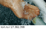 Stream of Water in Hands. Стоковое видео, видеограф Илья Шаматура / Фотобанк Лори
