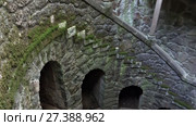 The Initiation Wells (Inverted tower) in Quinta da Regaleira estate. Sintra. Portugal (2017 год). Стоковое видео, видеограф Сергей Пристяжнюк (Serg Zastavkin) / Фотобанк Лори
