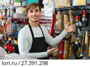 Professional young cheerful salesman working and smiling. Стоковое фото, фотограф Яков Филимонов / Фотобанк Лори
