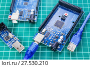 Russia, Cheboksary, September 16, 2018. Arduino boards for the development of electronics on the engineer's desk. Редакционное фото, фотограф Alexander / Фотобанк Лори