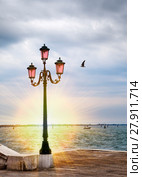 Romantic sunset views with ancient pink lantern on Grand Canal in front of the Basilika San Giorgio Maggiore in Venice, italy (2010 год). Стоковое фото, фотограф Куликов Константин / Фотобанк Лори