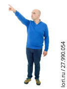 young casual man full body, pointing, isolated on a white background. Стоковое фото, фотограф Rui Vale de Sousa / Smarterpix / Фотобанк Лори