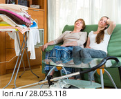 Two women having a rest after cleaning. Стоковое фото, фотограф Яков Филимонов / Фотобанк Лори