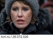 Кандидат на пост президента РФ от партии "Гражданская инициатива", телеведущая Ксения Собчак во время марша памяти политика Бориса Немцова на Страстном бульваре города Москвы, Россия, 25 февраля 2018. Редакционное фото, фотограф Николай Винокуров / Фотобанк Лори