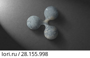 Ripple icon made of stone on a dark background. Стоковое фото, фотограф Ярослав Данильченко / Фотобанк Лори