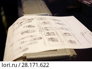 Fingerprints on paper, text translate - dactyloscopic registration, pinky, Control prints, big, nameless, registration. Стоковое фото, фотограф Losevsky Pavel / Фотобанк Лори