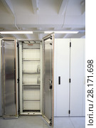 Opened storage for storing data in empty mobile cellular communication center. Стоковое фото, фотограф Losevsky Pavel / Фотобанк Лори