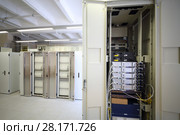 Telecom equipment with many cables and switches in modern communication center. Стоковое фото, фотограф Losevsky Pavel / Фотобанк Лори