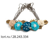 Handmade necklace in the form of several flowers of cyan, blue and beige colors on a white background. Стоковое фото, фотограф Олег Белов / Фотобанк Лори