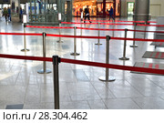Moscow, Russia - April 4. 2018. belt guardrails in Vnukovo airport. Редакционное фото, фотограф Володина Ольга / Фотобанк Лори
