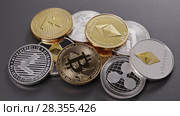 Different coins of crypto currency on a dark background. Slow motion. 1080p Full HD video. Стоковое видео, видеограф Ярослав Данильченко / Фотобанк Лори