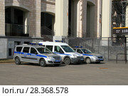 Автомобили полиции у Большой спортивной арены "Лужники". ОПО ОК "Лужники" ОМВД России по району Хамовники города Москвы (2018 год). Редакционное фото, фотограф Щеголева Ольга / Фотобанк Лори