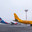 Самолеты Embraer ("Эмбраер") ERJ-195AR с бортовым номером VQ-BRX авиакомпании Saratov Airlines ("Саратовские авиалинии") и Boeing ("Боинг") 767-306 авиакомпании Azur Air ("Азур Эйр") с бортовым номером VQ-BSX в аэропорту Домодедово. Москва (2017 год). Редакционное фото, фотограф Ольга Шуклина / Фотобанк Лори
