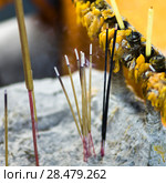 Close-up of incense sticks burning at temple, Krong Siem Reap, Siem Reap, Cambodia. Стоковое фото, фотограф Keith Levit / Ingram Publishing / Фотобанк Лори