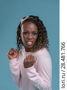 Lovely african woman disappointed and boxing. Стоковое фото, фотограф Kirill Kedrinskiy / Ingram Publishing / Фотобанк Лори