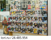 LE MANS, FRANCE - OCTOBER 08, 2017: Row of figures of American company Funko Pop in the shop window. Редакционное фото, фотограф Irina Kuchugurina/Gaudy / Фотобанк Лори