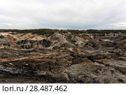 Multicolored industrial dumps at the mining site of minerals by open method. Стоковое фото, фотограф Евгений Харитонов / Фотобанк Лори