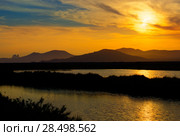 Ibiza ses Salines saltworks at sunset in Sant Josep at Balearic Islands of Spain. Стоковое фото, фотограф Tono Balaguer / Ingram Publishing / Фотобанк Лори