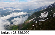 movement along of Caucasian mountains from Rosa Khutor resort in Russia. Стоковое видео, видеограф Володина Ольга / Фотобанк Лори