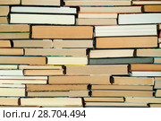 Background - a wall composed of books of different sizes. Стоковое фото, фотограф Евгений Харитонов / Фотобанк Лори