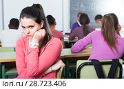 ﻿lonely school pupil sitting away. Стоковое фото, фотограф Яков Филимонов / Фотобанк Лори