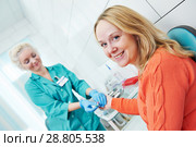 Blood test with disposable lancelet. nurse and woman at clinic. Стоковое фото, фотограф Дмитрий Калиновский / Фотобанк Лори