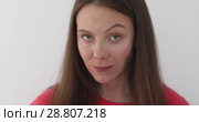 Girl holding chewing gum her mouth. Стоковое видео, видеограф Ekaterina Demidova / Фотобанк Лори