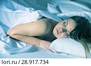 Young female in pygamas is sleeping on bed. Стоковое фото, фотограф Яков Филимонов / Фотобанк Лори