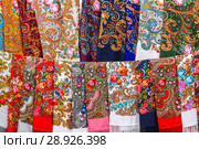 Sale of Russian decorative multi-colored scarves. Russia, Suzdal. Стоковое фото, фотограф Artem Sobov / Фотобанк Лори