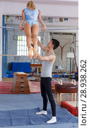 Man and woman training on sports equipment. Стоковое фото, фотограф Яков Филимонов / Фотобанк Лори