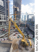 Modern building constraction site works. (2016 год). Редакционное фото, фотограф Matej Kastelic / Фотобанк Лори