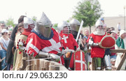 Bulgar, Russian Federation - August 2018, - men in knightly costumes waiting for their exit in the center of the tournament. Редакционное видео, видеограф Константин Шишкин / Фотобанк Лори
