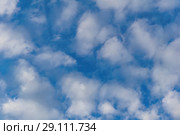 Background - blue day sky with white cirro-cumulus clouds. Стоковое фото, фотограф Евгений Харитонов / Фотобанк Лори