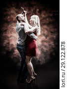 Young and sexy couple dances Caribbean Salsa. Стоковое фото, фотограф Игорь Бородин / Фотобанк Лори