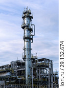 Fluid catalytic cracking unit (FCC) in a modern chemical factory. equipment of oil refinery. Стоковое фото, фотограф Евгений Харитонов / Фотобанк Лори
