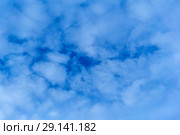 Celestial background - blue day sky with white cirro-cumulus clouds. Стоковое фото, фотограф Евгений Харитонов / Фотобанк Лори