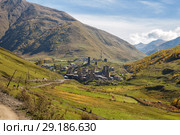 View of mountain village Ushguli with traditional Svan towers. Upper Svaneti, Georgia (2018 год). Стоковое фото, фотограф Юлия Бабкина / Фотобанк Лори