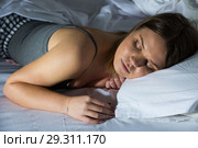 Sexy girl in pygamas sleeping in bed at home. Стоковое фото, фотограф Яков Филимонов / Фотобанк Лори