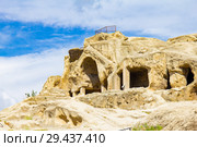 Beautuful View to Ancient Orthodox Church in mount in antique cave city Uplistsikhe. The Uplistsikhe 9th-10th century three-nave basilica and vale of Mtkvari river, Shida Kartli, Gori, Georgia. Стоковое фото, фотограф Алексей Ширманов / Фотобанк Лори