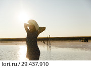happy smiling girl in white hat enjoying sun, expanse of Bascunchak salt lake. Стоковое фото, фотограф Ирина Мойсеева / Фотобанк Лори