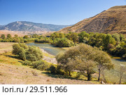 Picturesque landscape of the Kura River in Samtskhe-Javakheti, Georgia. Sunny early autumn day. Стоковое фото, фотограф Юлия Бабкина / Фотобанк Лори