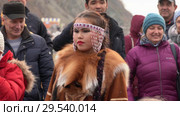 Young woman dancer in national clothing indigenous Kamchatka decorated with red fox (2018 год). Редакционное видео, видеограф А. А. Пирагис / Фотобанк Лори