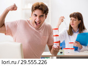 Male sperm donor visiting clinic. Стоковое фото, фотограф Elnur / Фотобанк Лори